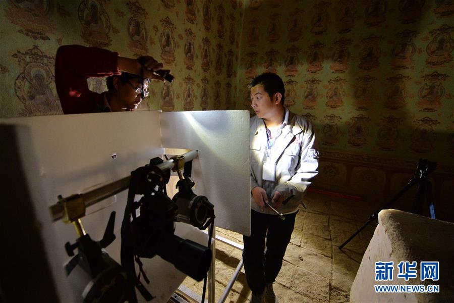 (時代先鋒·圖文互動)(16)此生不悔入沙海 勇擔重任始見金——敦煌研究院文物保護利用群體群像