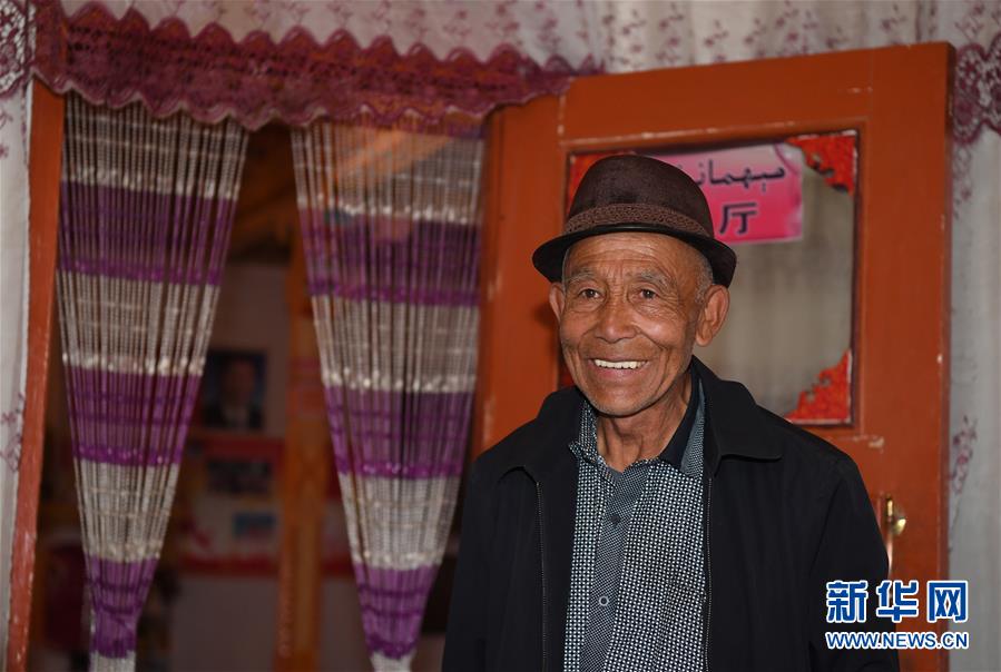 (決戰(zhàn)決勝脫貧攻堅(jiān)·聚焦三區(qū)三州·圖文互動(dòng))(6)昆侖山村建起停車場(chǎng)