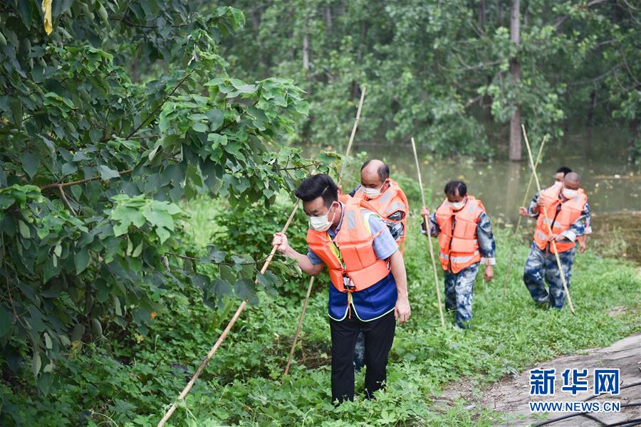 （在習近平新時代中國特色社會主義思想指引下——新時代新作為新篇章·習近平總書記關切事·圖文互動）（2）戰疫魔,斗洪魔——湖北全力應對防疫、防汛疊加“雙考”