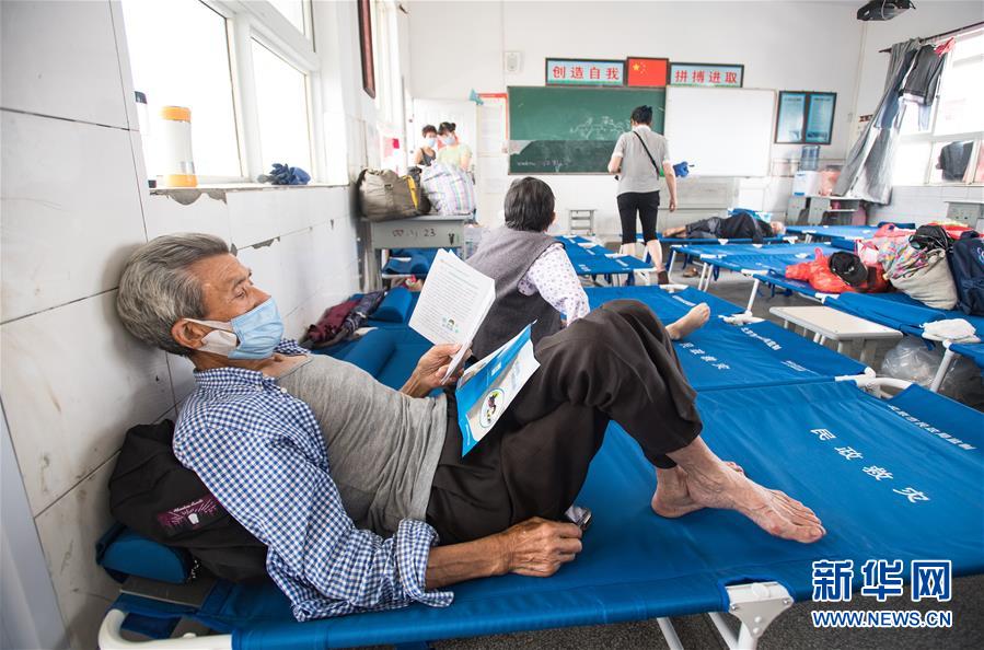 （在習近平新時代中國特色社會主義思想指引下——新時代新作為新篇章·習近平總書記關切事·圖文互動）（5）戰疫魔,斗洪魔——湖北全力應對防疫、防汛疊加“雙考”