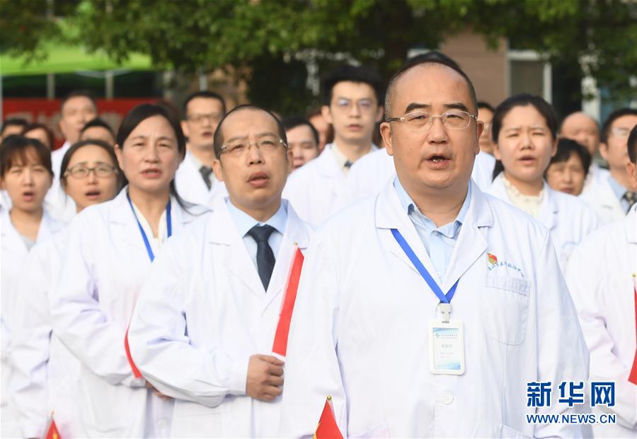 (抗疫先進事跡·圖文互動)(2)張定宇:疫情“暴風眼”里,“漸凍”之軀與時間賽跑