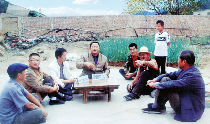 調(diào)解“家長(zhǎng)里短,雞毛蒜皮”的小事情是李培斌從事的大事業(yè)