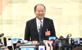 國家統計局局長接受采訪