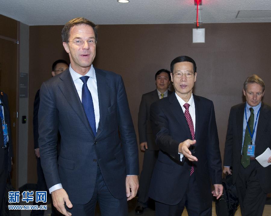 9月23日，出席聯(lián)合國氣候峰會的國家主席習(xí)近平特使、國務(wù)院副總理張高麗在紐約聯(lián)合國總部會見荷蘭首相呂特。 新華社記者 王曄 攝 