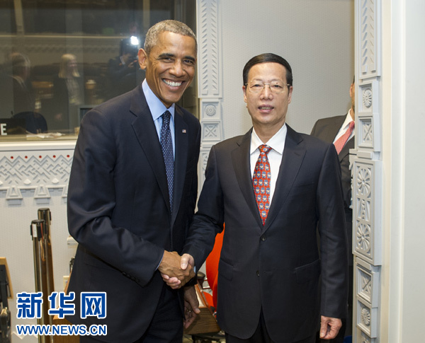 9月23日，國家主席習(xí)近平特使、國務(wù)院副總理張高麗在紐約會見出席聯(lián)合國氣候峰會的美國總統(tǒng)奧巴馬。 新華社記者王曄攝